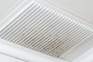 What are the common causes of poor airflow from my AC vents in San Marcos, TX