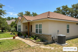 Residential HVAC system outside a San Marcos, TX home